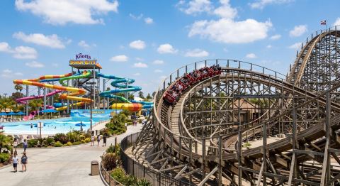 Roller coaster and water park slides at a theme park